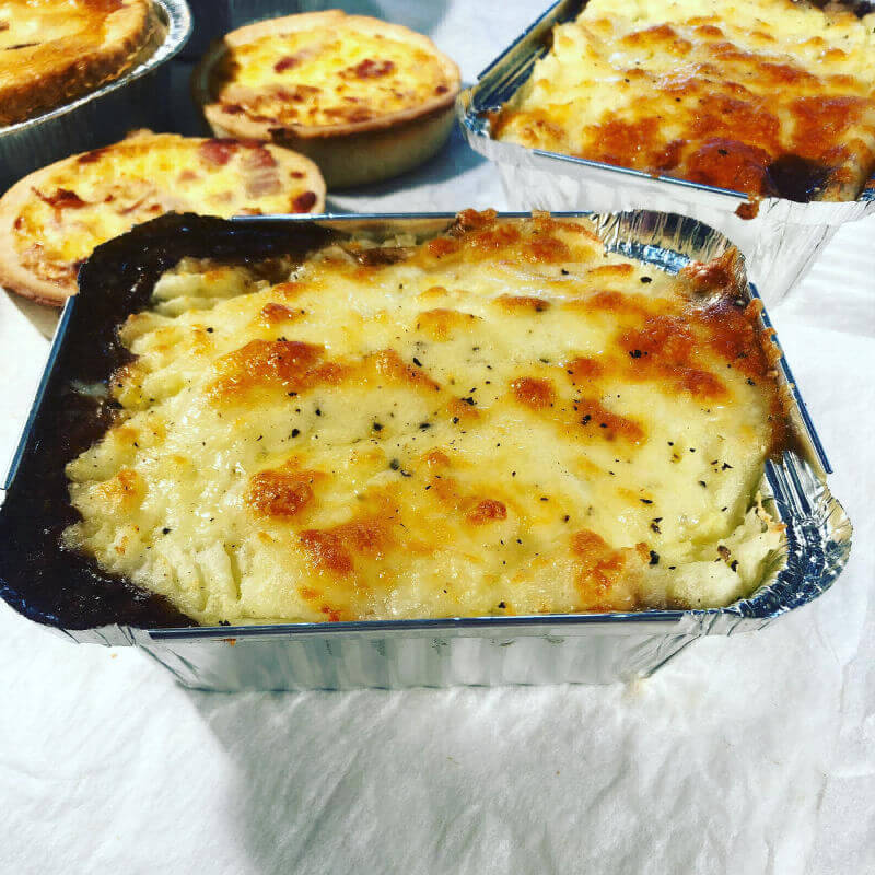 FReshly baked lasagna and quiche